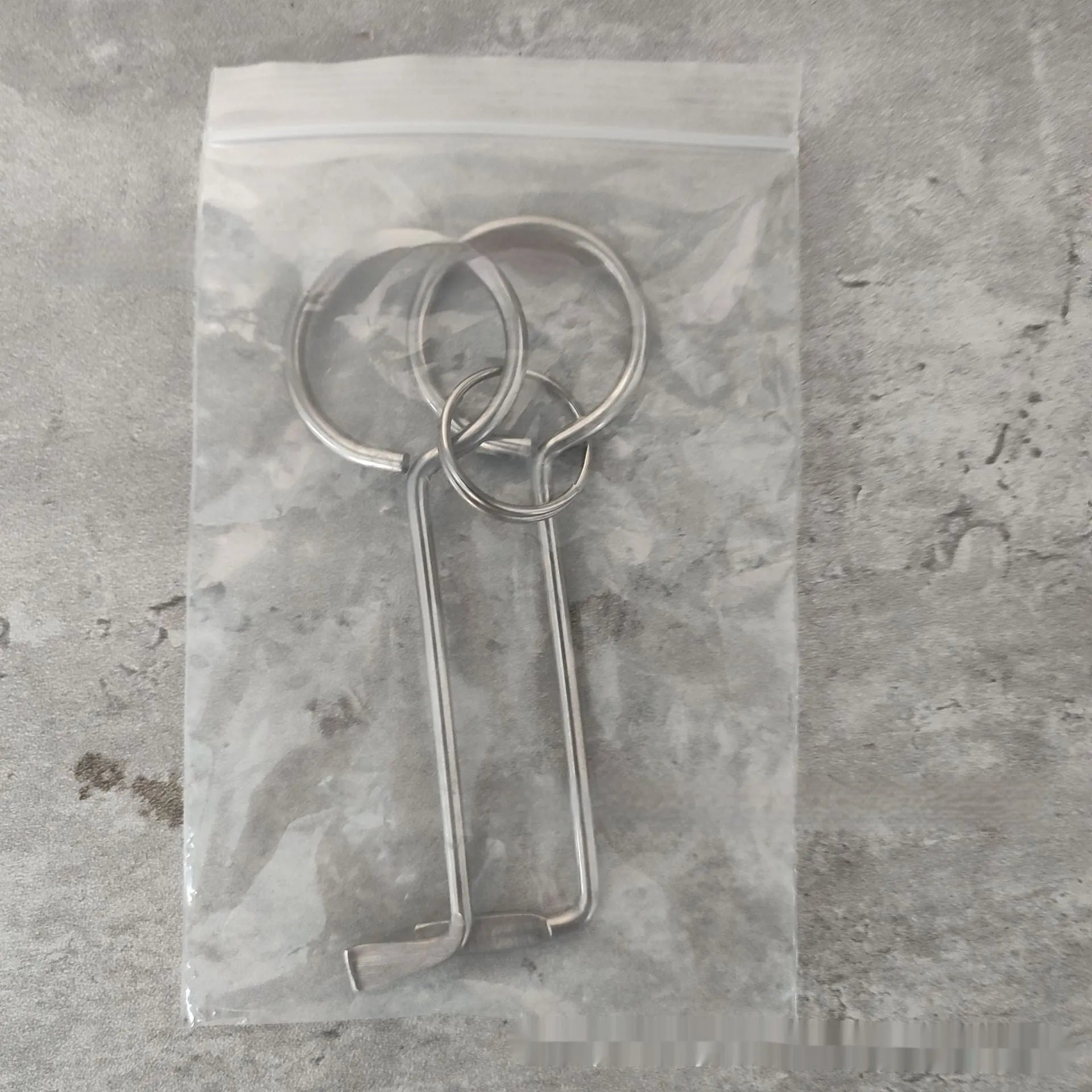 Two-piece alloy wrench tool set showing both wrenches with universal fitting ends