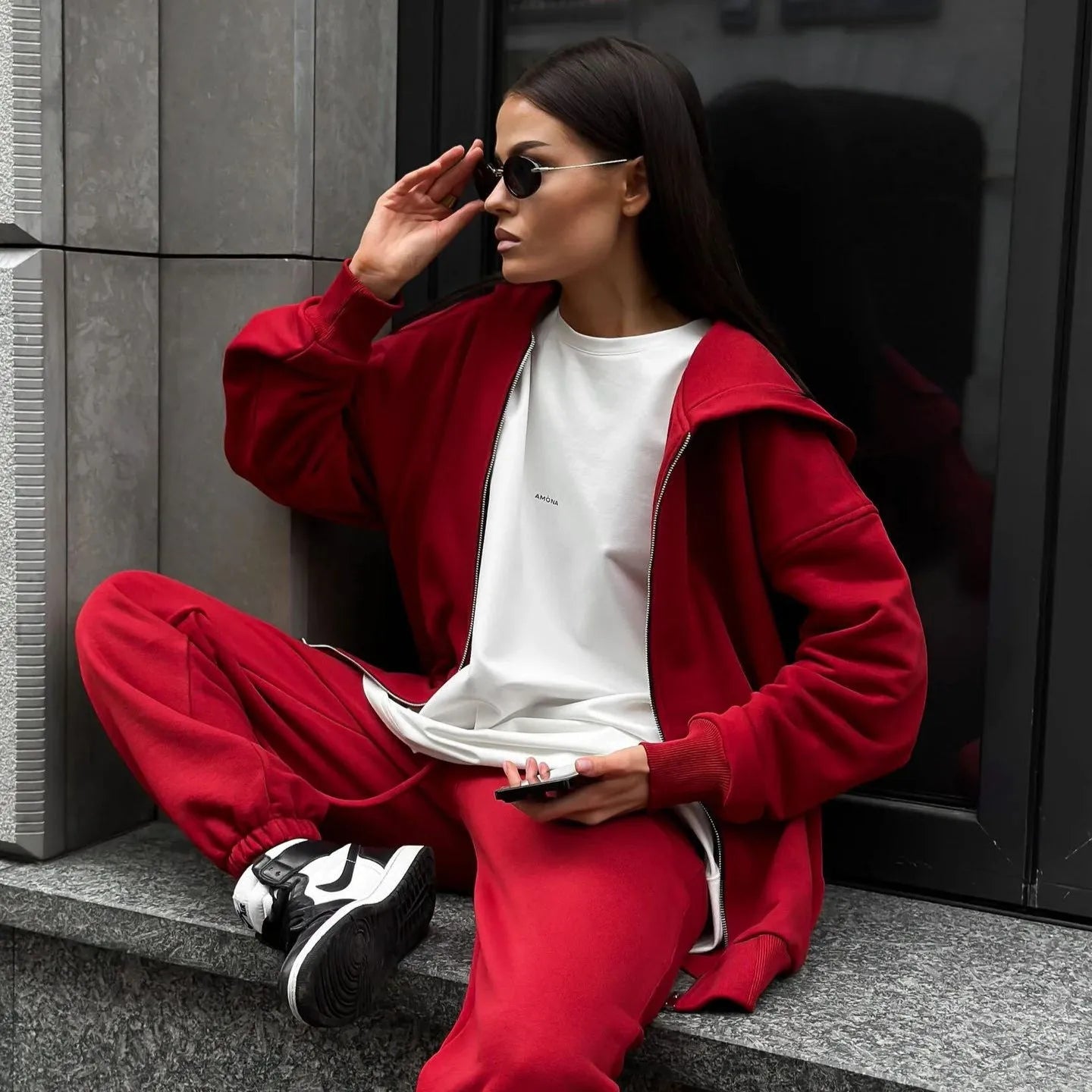Street style loose-fit two-piece set with long-sleeved coat and trousers in grey.