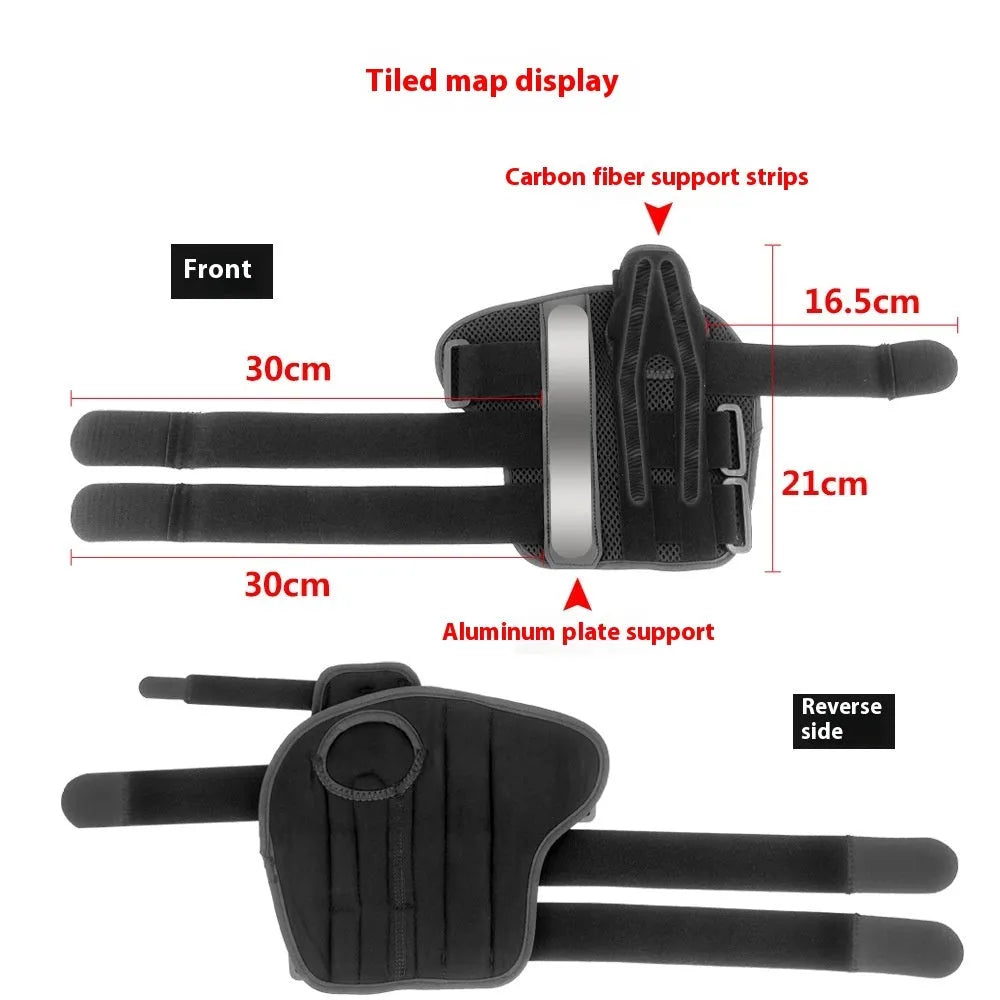 Black sports wrist guard with grey edging and a thumb strap, showing carbon fibre reinforcement panel.