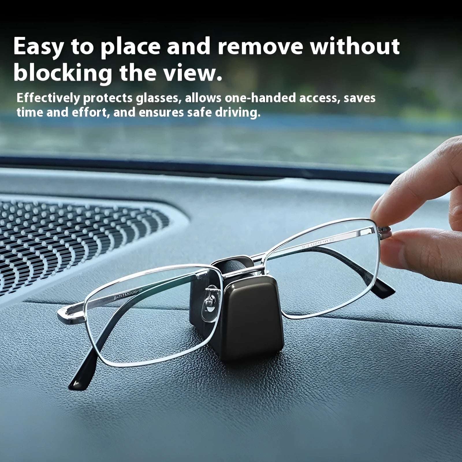 Green zinc alloy and leather glasses clip holder mounted on a car dashboard.