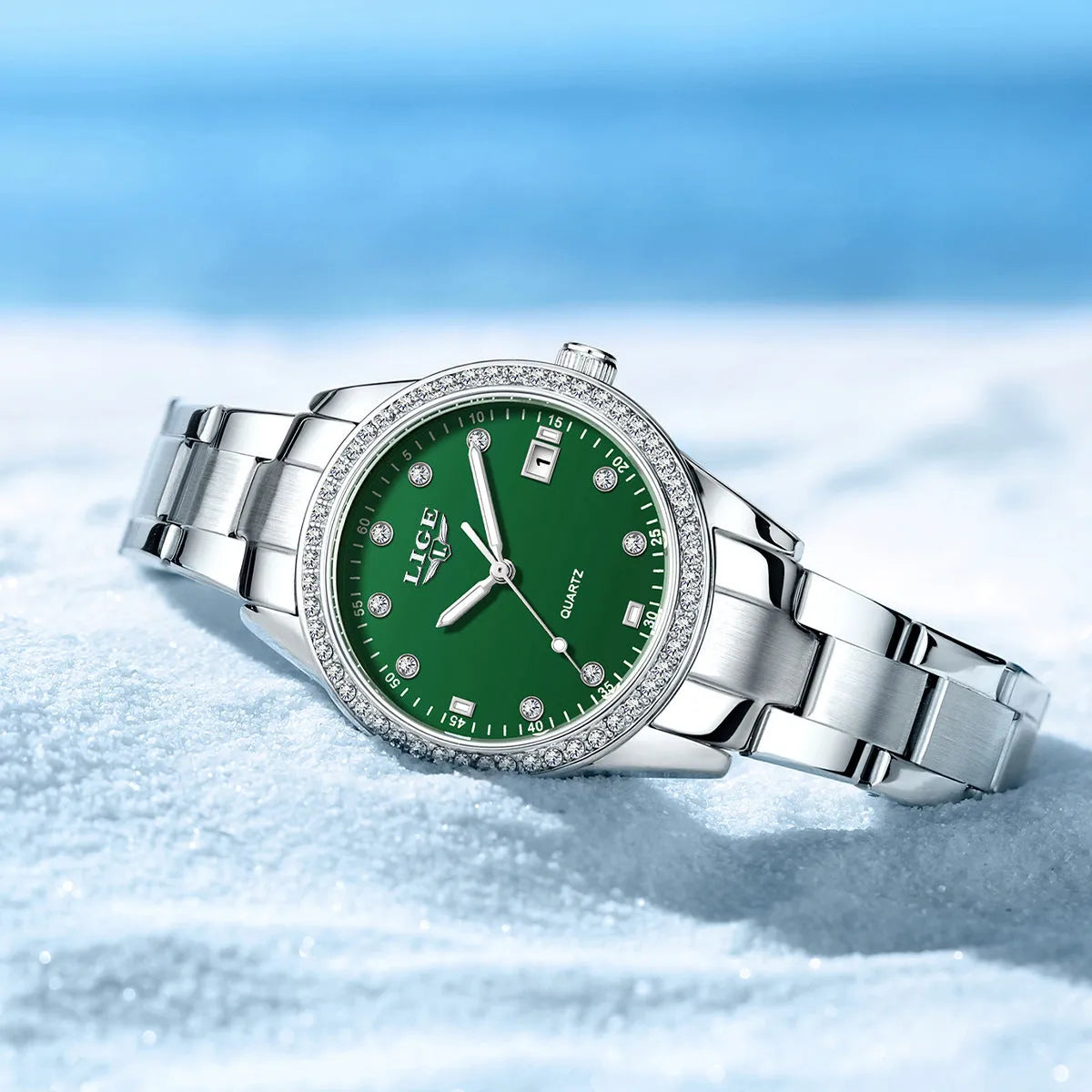 Women's silver fashion watch with diamond bezel, luminous hands and round dial