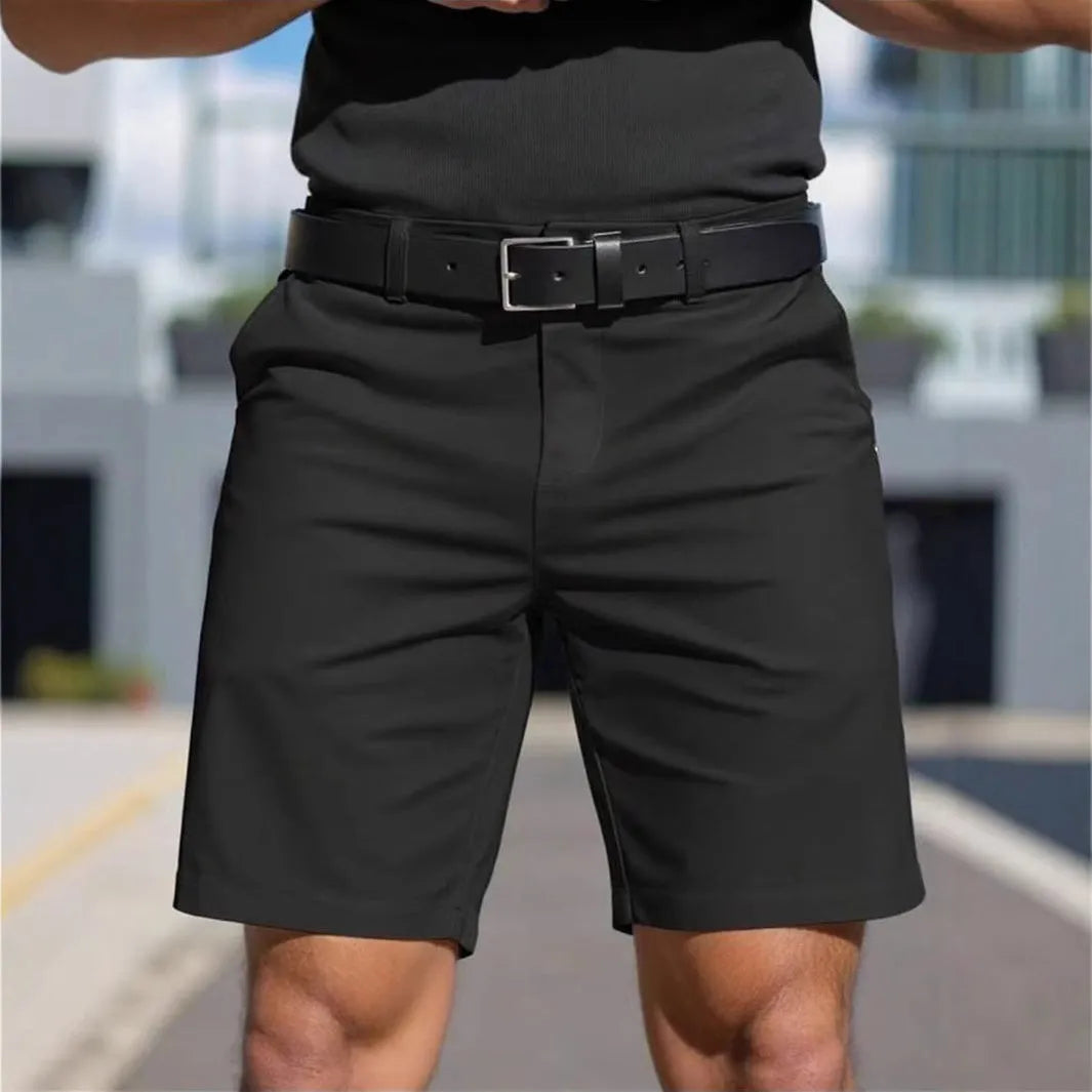 Men's solid colour straight-leg polyester shorts with micro elasticity, shown in apricot.