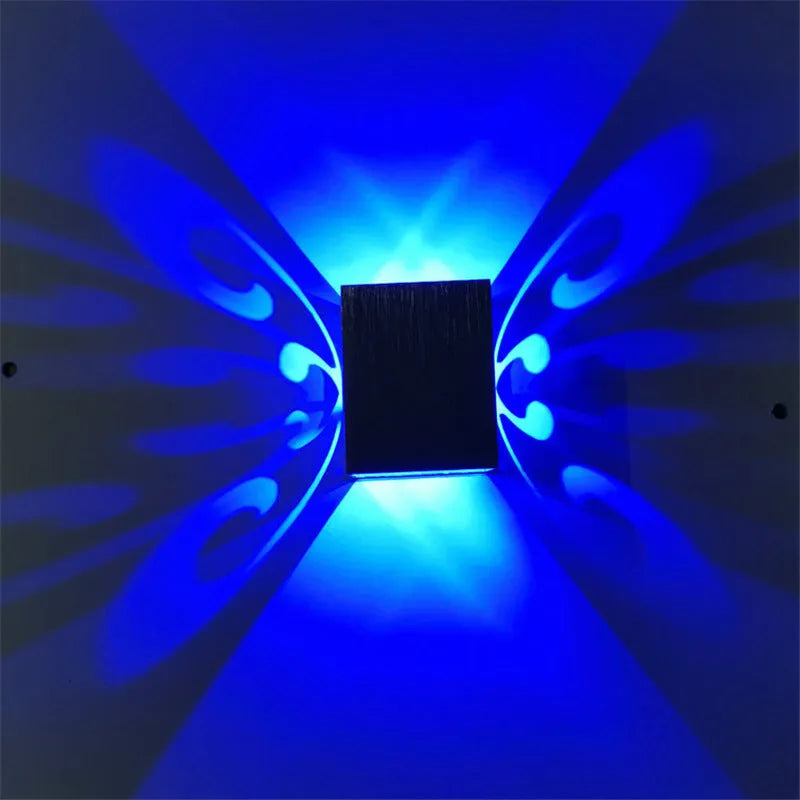 Butterfly-shaped LED wall lamp with aluminium shade in modern style