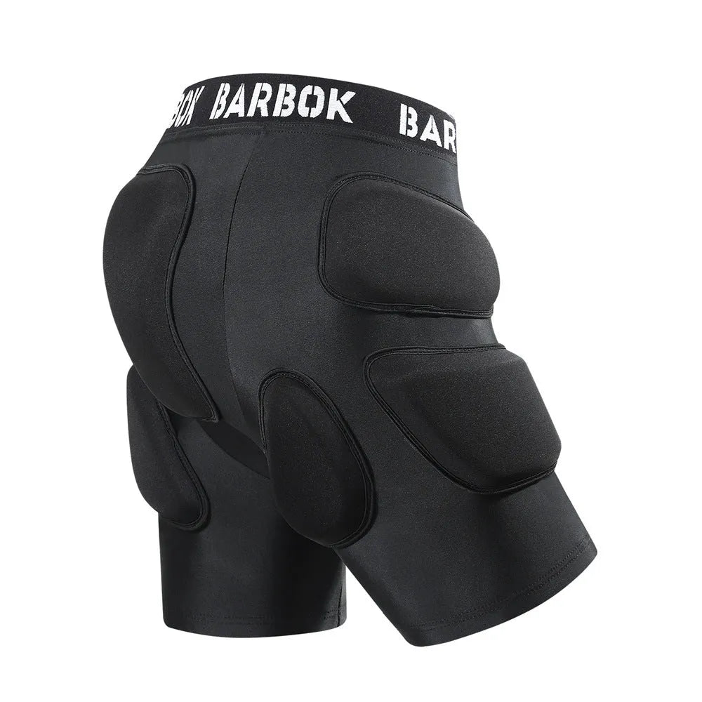 Black protective spandex trousers with integrated hip pads for skating and skateboard fall protection.