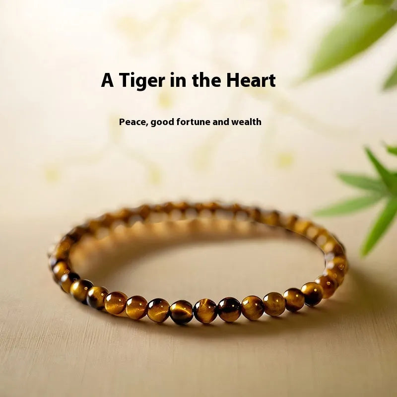 Tigereye stone bracelet with geometric design in Chinese style, showing bead details