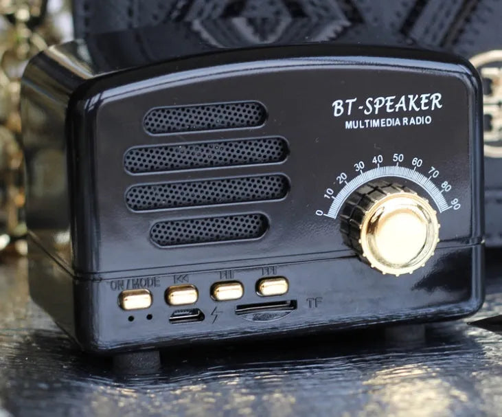 Vintage wood design Bluetooth speaker in compact size with USB charging port