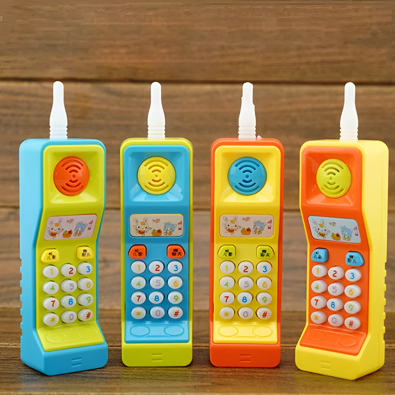 Children's educational toy with sound, light and music features showing cartoon animal designs