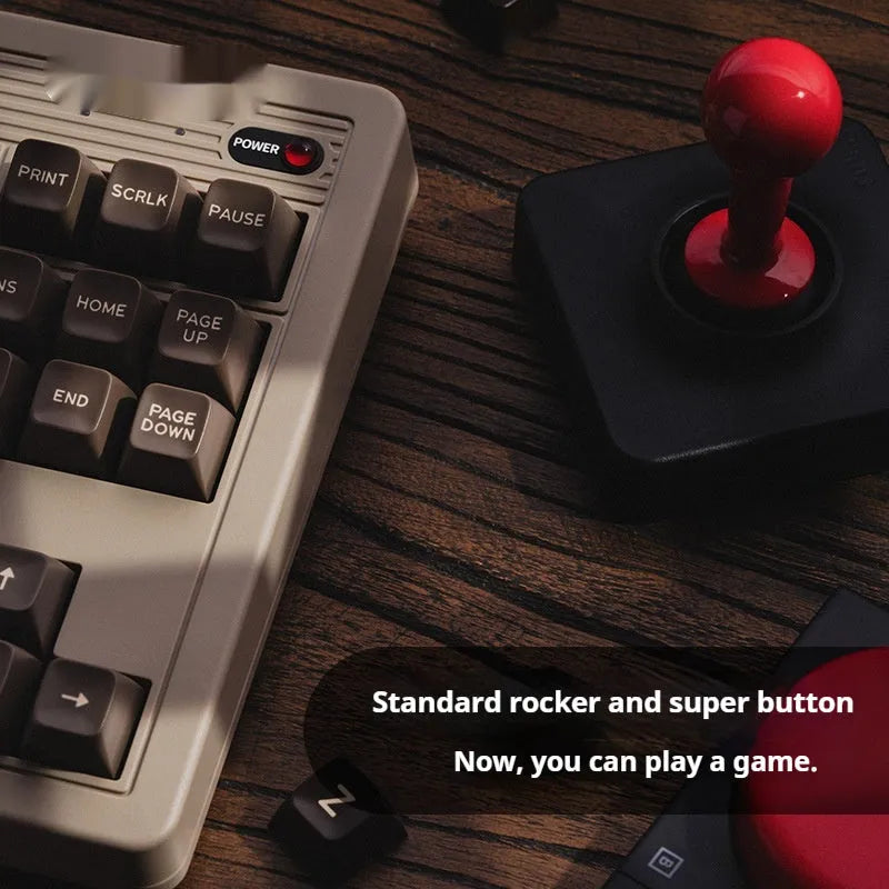 Retro87 C64 mechanical gaming keyboard with rocker design and wireless Bluetooth connectivity