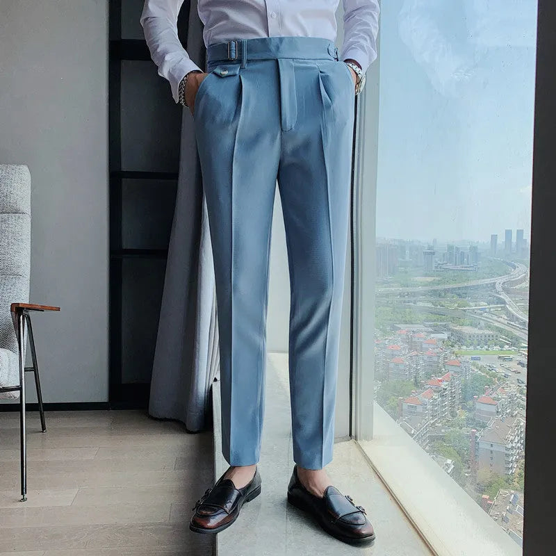 Straight-leg casual trousers in solid colour on hanger showing waistband and leg detail