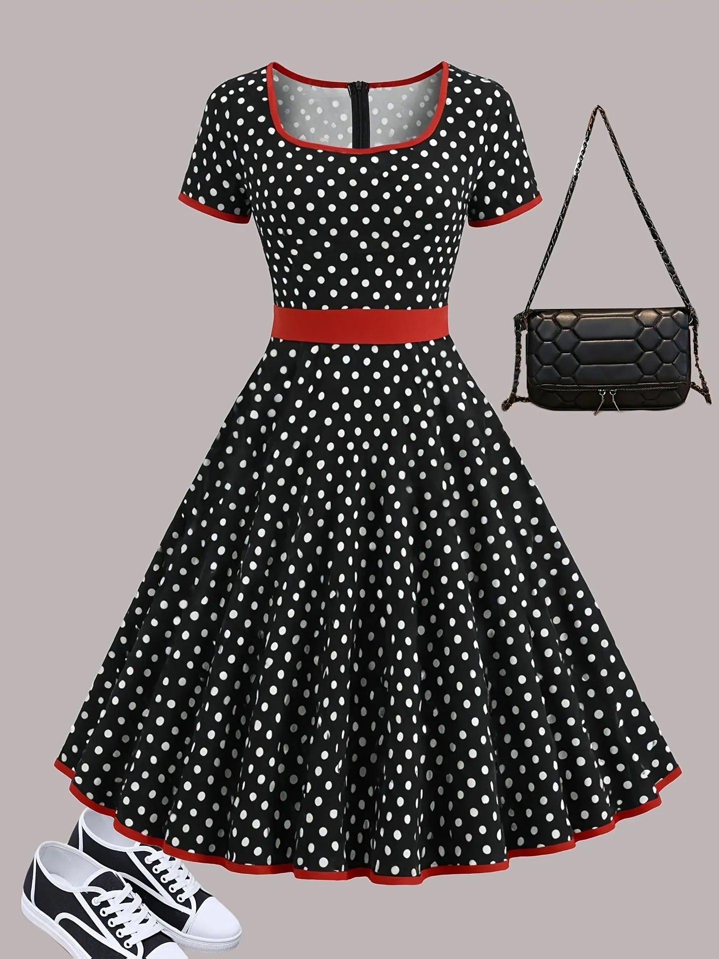 Multicolour polka dot dress with square collar, short sleeves, zip front, and pleated mid-length skirt.