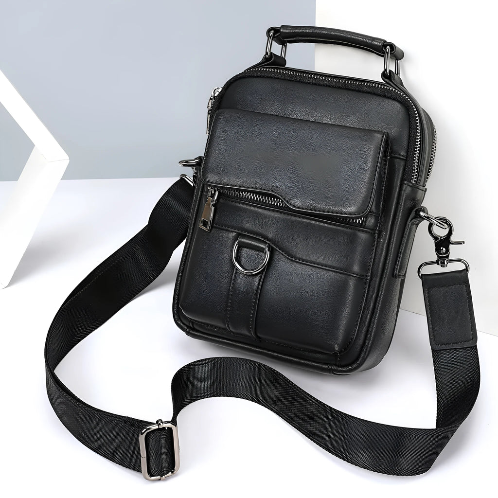 Black genuine first layer cowhide leather messenger bag measuring 19x8x24cm with slung strap