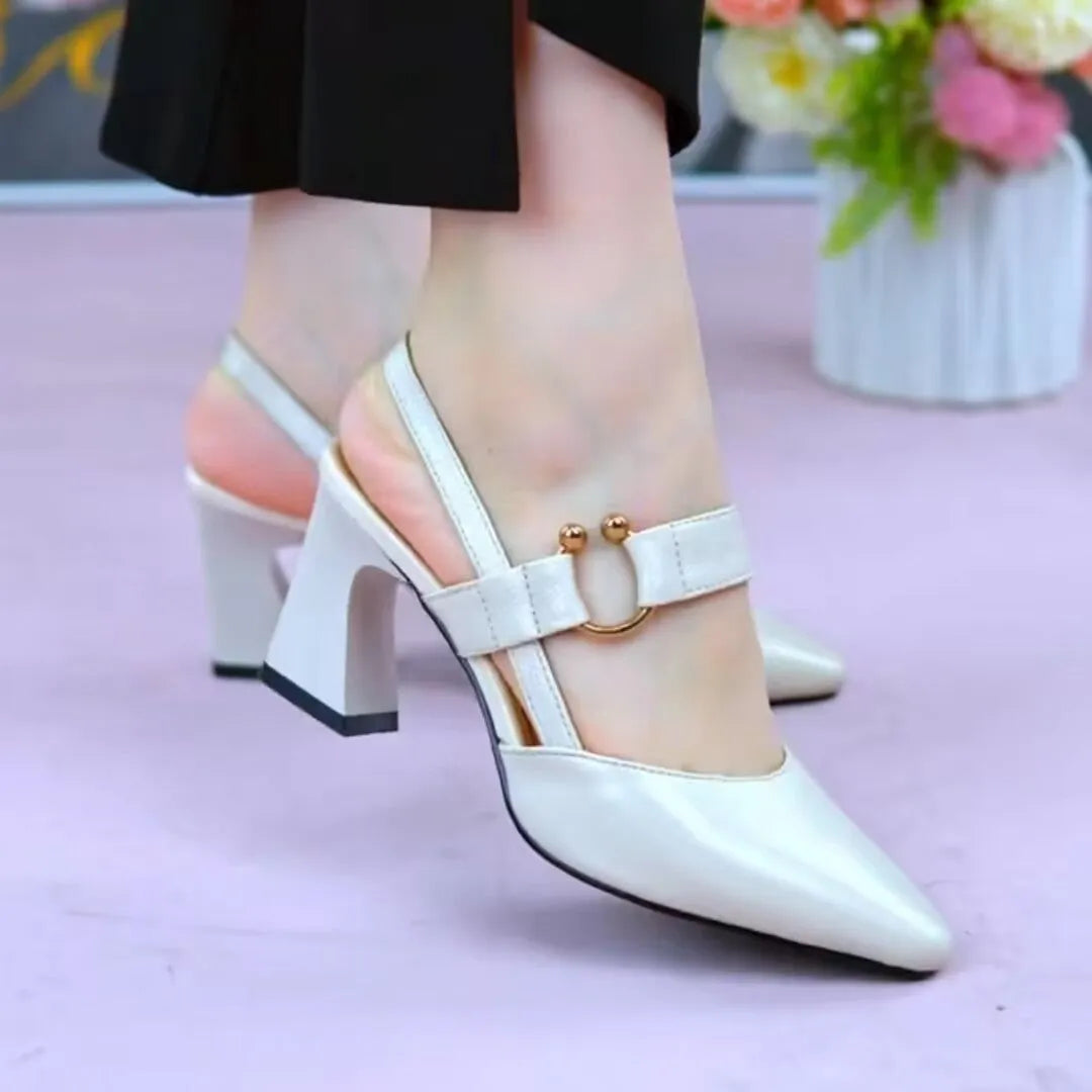 Women's black closed toe leather sandals with a chunky block heel and strapless slip-on design.