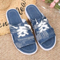 Blue Roman style women's canvas slippers with flat design and rubber sole