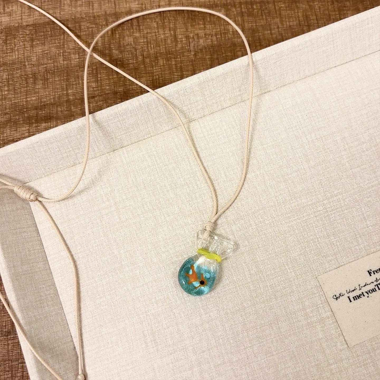 Women's necklace with coloured glaze skirt joker pendant on cotton linen clavicle chain