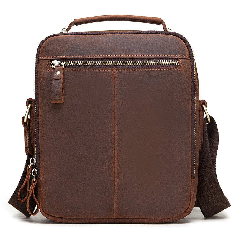 Men's brown Crazy Horse leather crossbody bag with sewing line details and crossbody strap