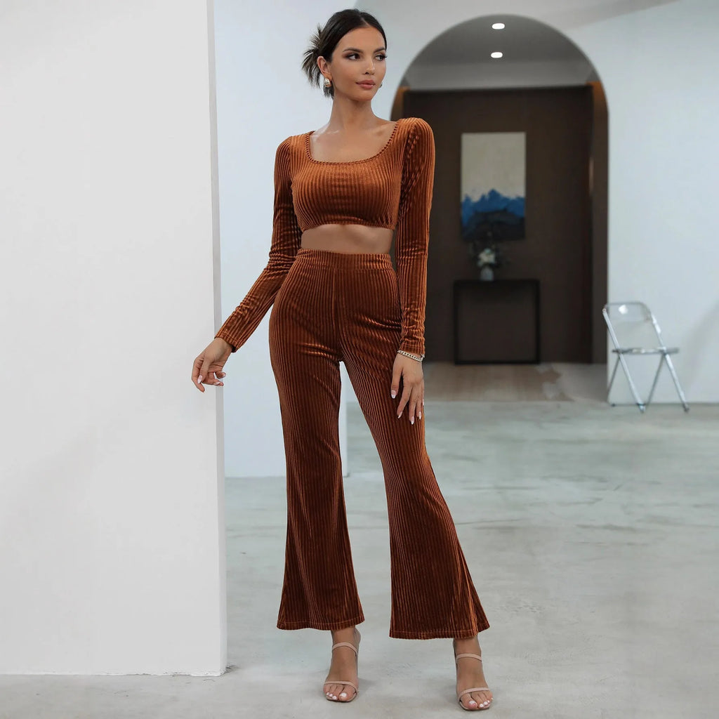 Caramel-coloured long sleeve sweater and trouser set on hanger