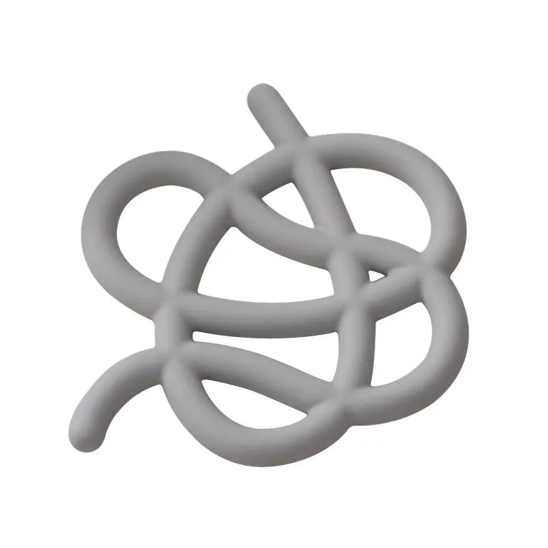 Ceramic heat proof mat in irregular shape on dining table surface