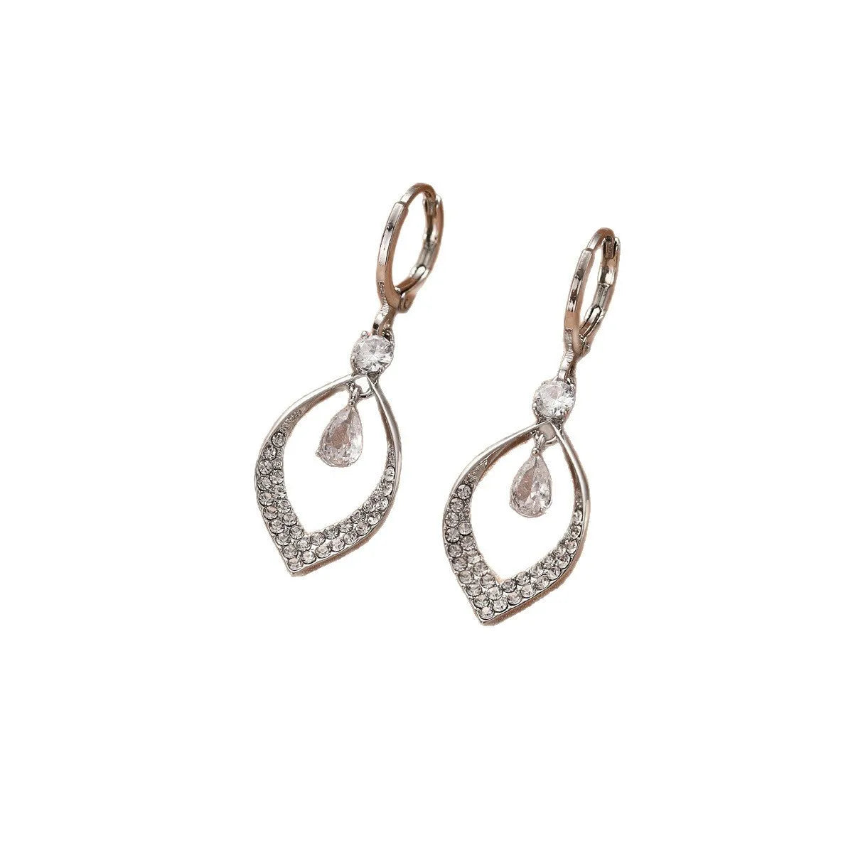 Copper electroplated women's earrings with a teardrop shape, water drop tassels, and zircon stones in gold colour.