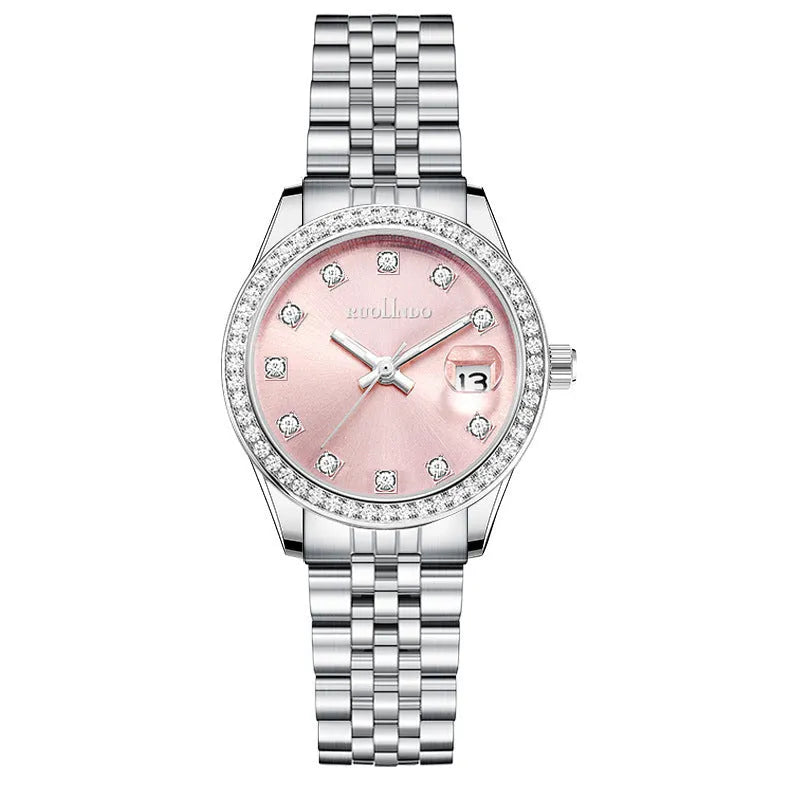 Women's silver alloy fashion watch with circular dial and stainless steel buckle on wrist.