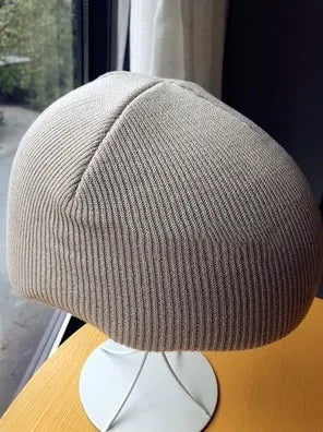 A size L decorative cover for a ski helmet, shown in one of fifteen available colour options.