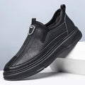 Men's black leather casual shoes with a round toe on a white background.