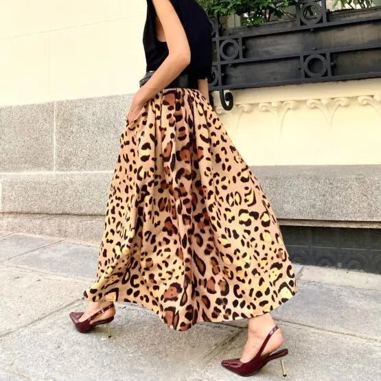 Brown leopard print women's long A-line skirt with a big hem.