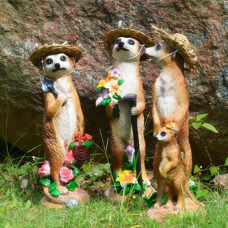 Straw hat mongoose garden ornament crafted from synthetic resin in three colour variations