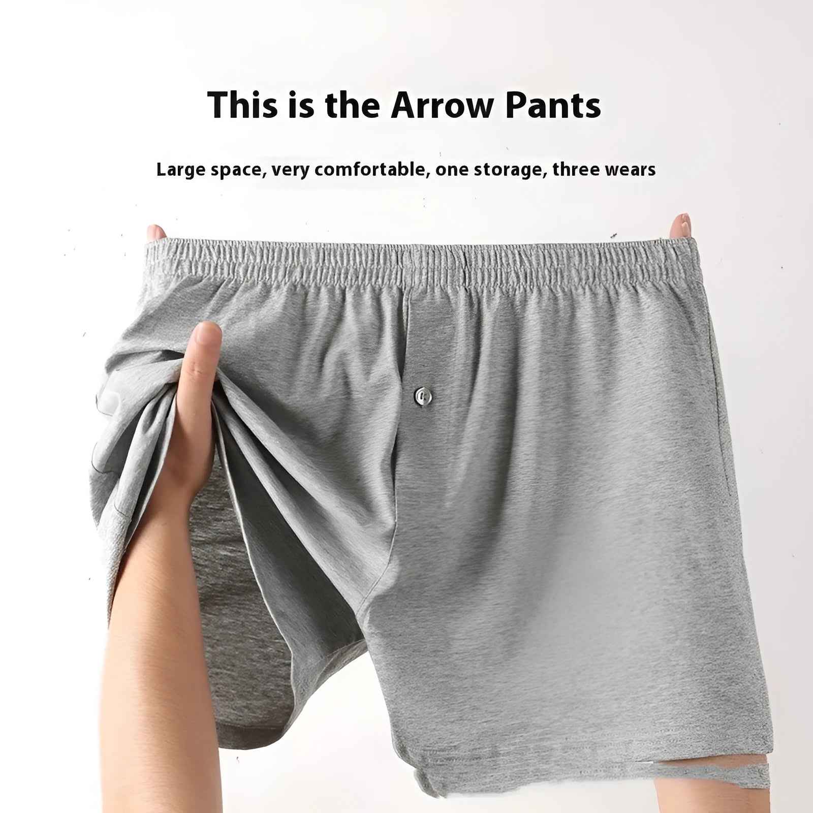 Men's solid-colour pure cotton boxer shorts with a high-waist and loose fit on a plain background.