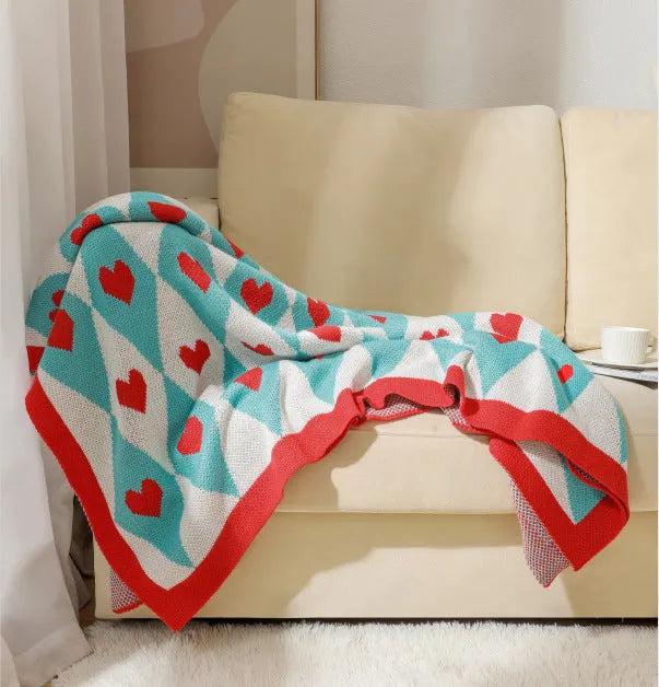 Bohemian-style acrylic sofa blanket with tassel edges in geometric pattern or solid colour options
