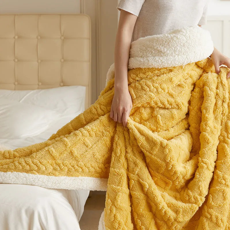 Polyester thermal flannel blanket in beige, folded to show texture and size.