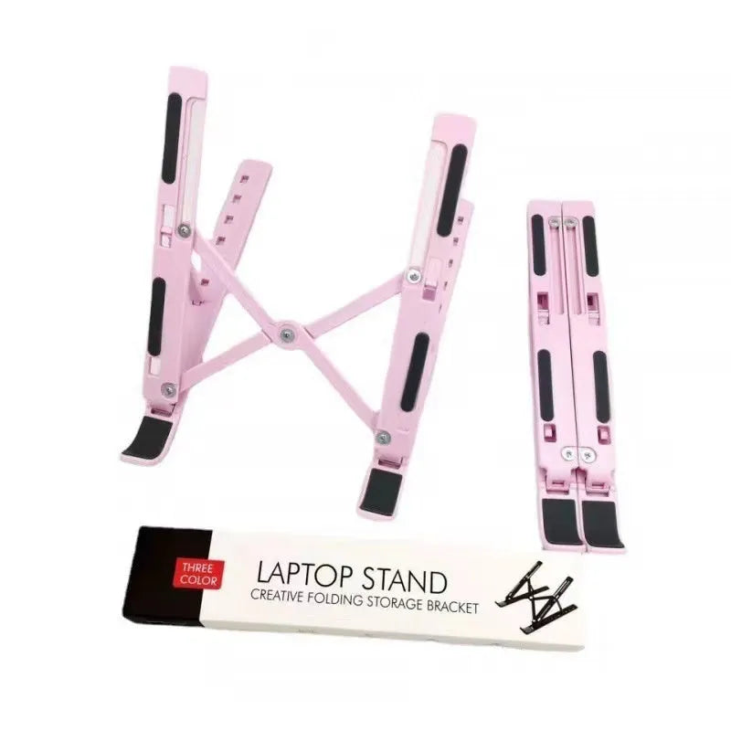 Silver aluminum alloy folding laptop stand supporting a large 18 inch notebook on a desk