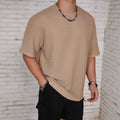 Men's slim fit polyester t-shirt in solid colours with round neck and short sleeves