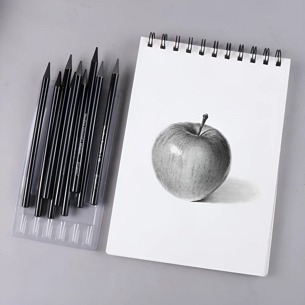 Solid graphite and carbonised drawing pencil set on a suction card pack.