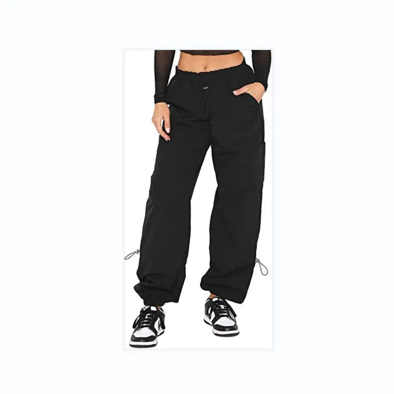 Straight-leg loose fit cargo casual pants in grey with multiple pockets, made from polyester fabric.