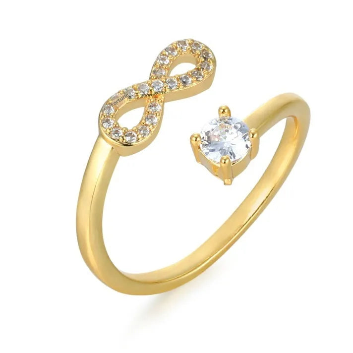 Personalised diamond-shaped open geometric zircon ring showing a letter 'A' in a gold metal setting.