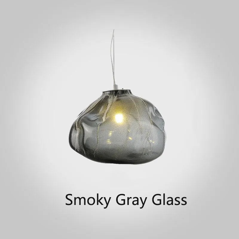 Modern glass and fabric chandelier light fixture in amber, clear or smoke grey.