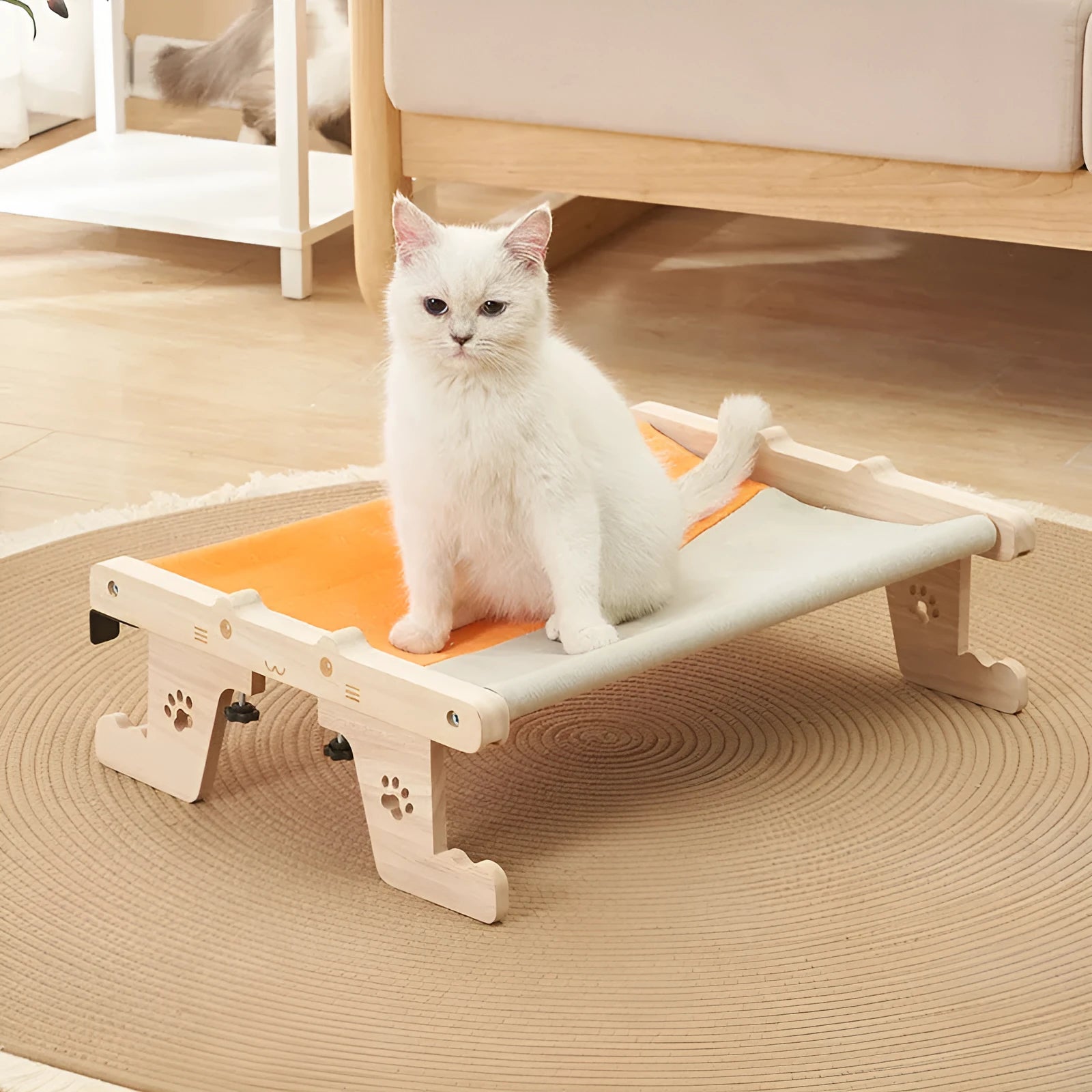 Wooden cat hanging bed hammock mounted on a balcony railing