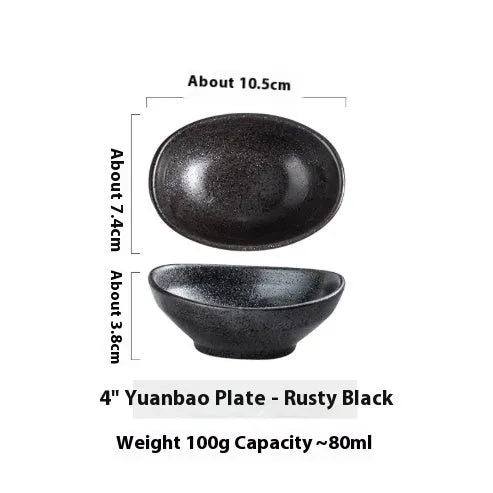 Oval Japanese ceramic sauce dipping bowl on a table, showing its 5cm height and decorative underglaze pattern.