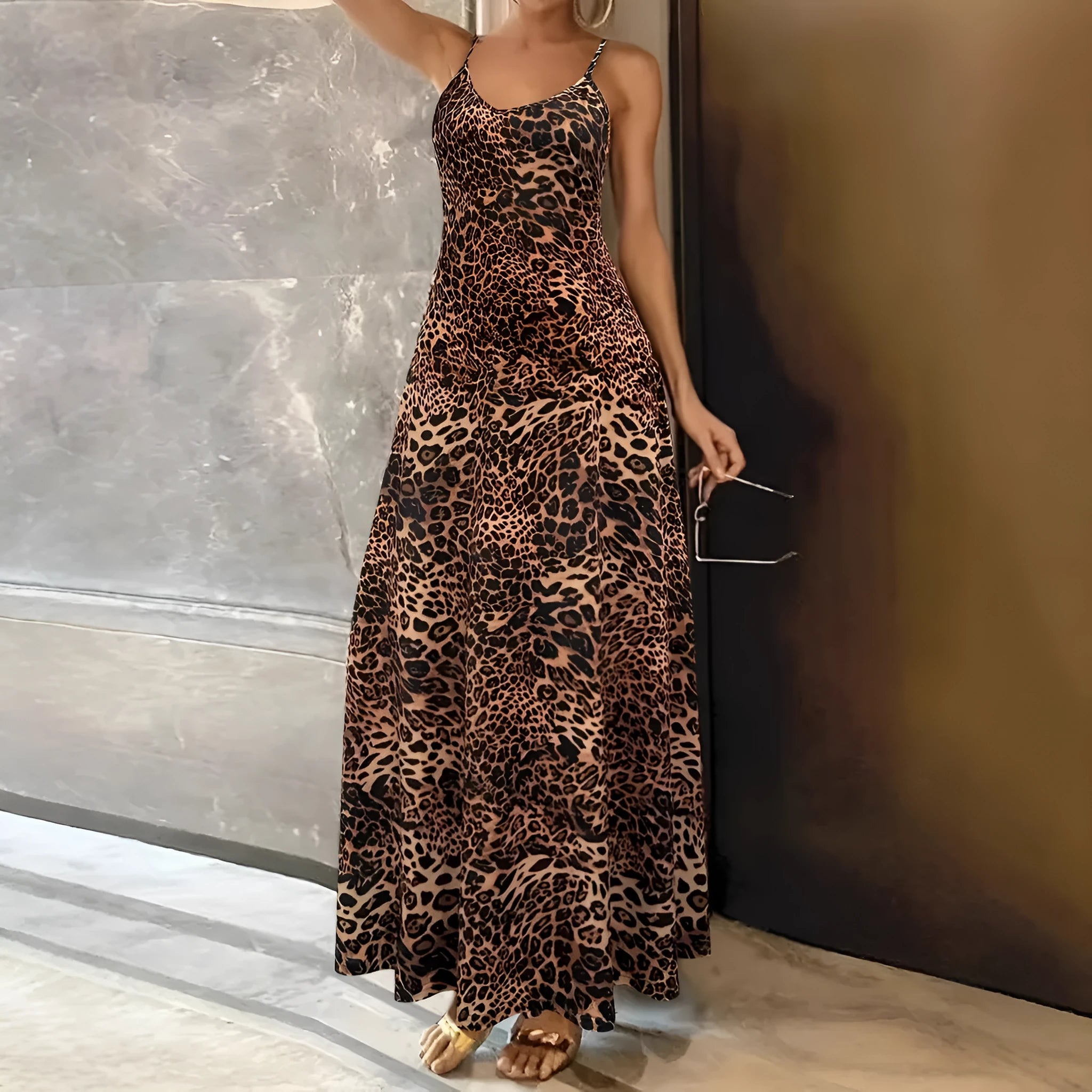 Dark brown leopard print sleeveless dress with round neck and shoulder strap design in milk silk polyester fabric