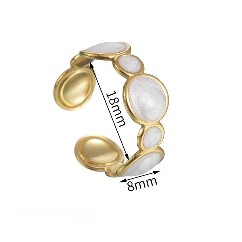 Adjustable opening geometric ring for women in stainless steel with electroplated finish