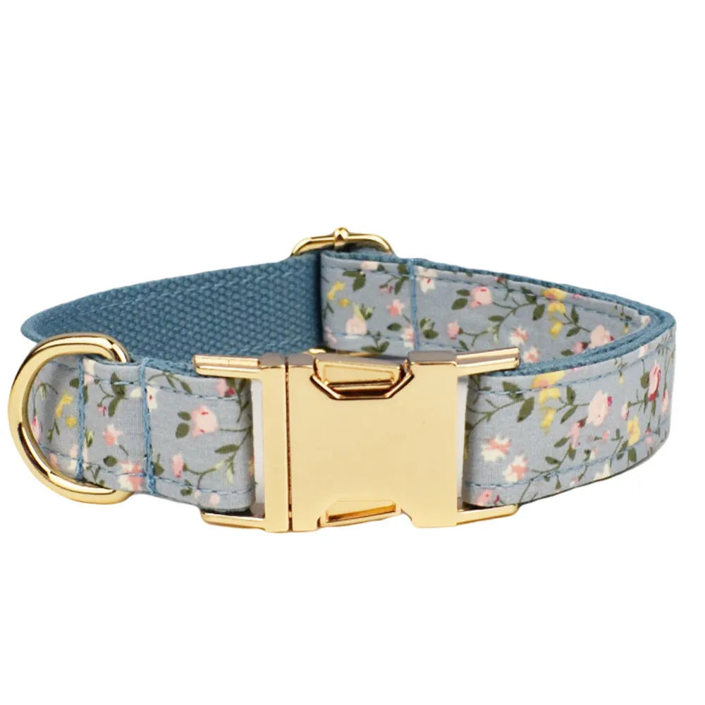 Blue floral polyester cotton dog collar set with matching leash, bow tie and vest accessories