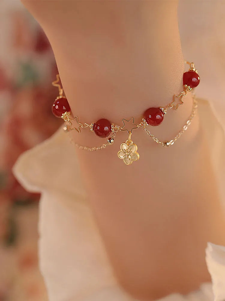 Red agate double layer women's bracelet with floral and peach blossom designs on natural stone