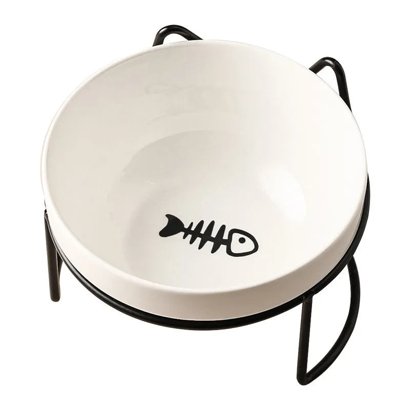 White ceramic cat bowl with cat paw print pattern in a black iron cat-ear frame