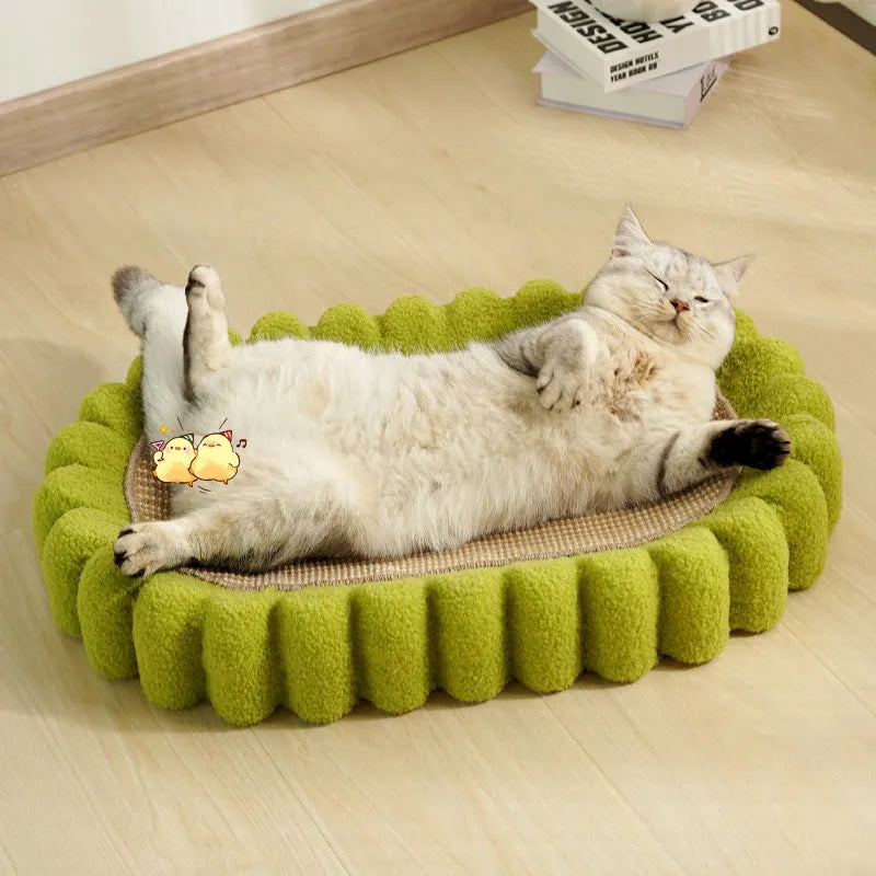 Green oval cat scratch pad and lounge bed made from sisal material