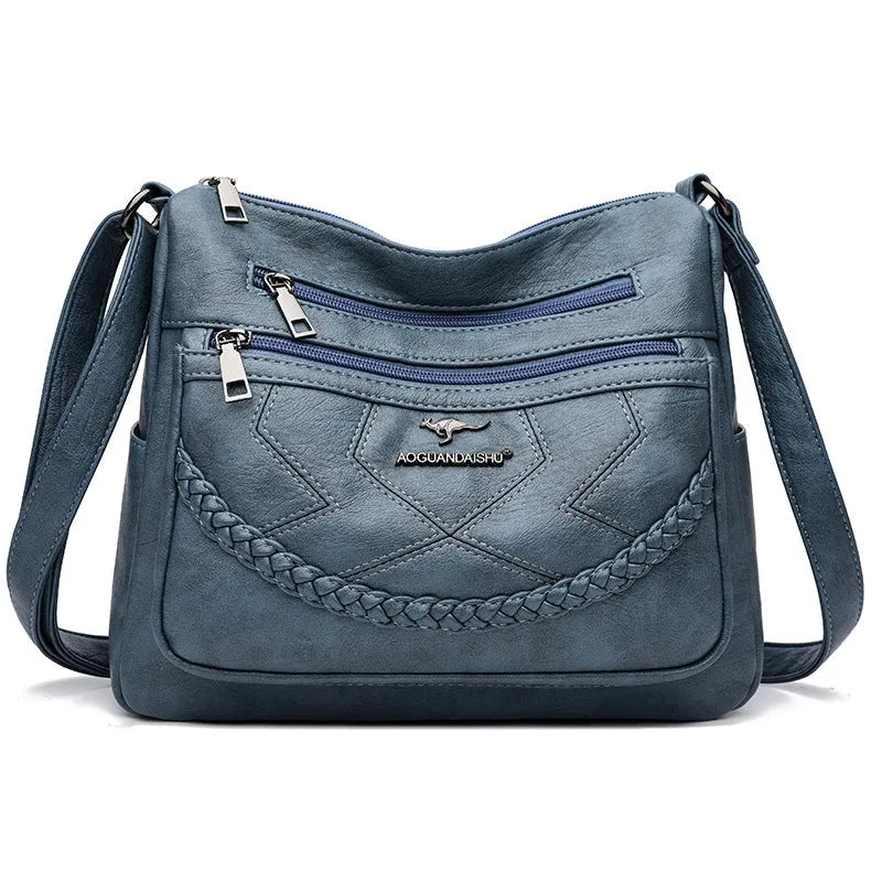 Soft PU leather crossbody shoulder bag in horizontal square shape with crossbody strap