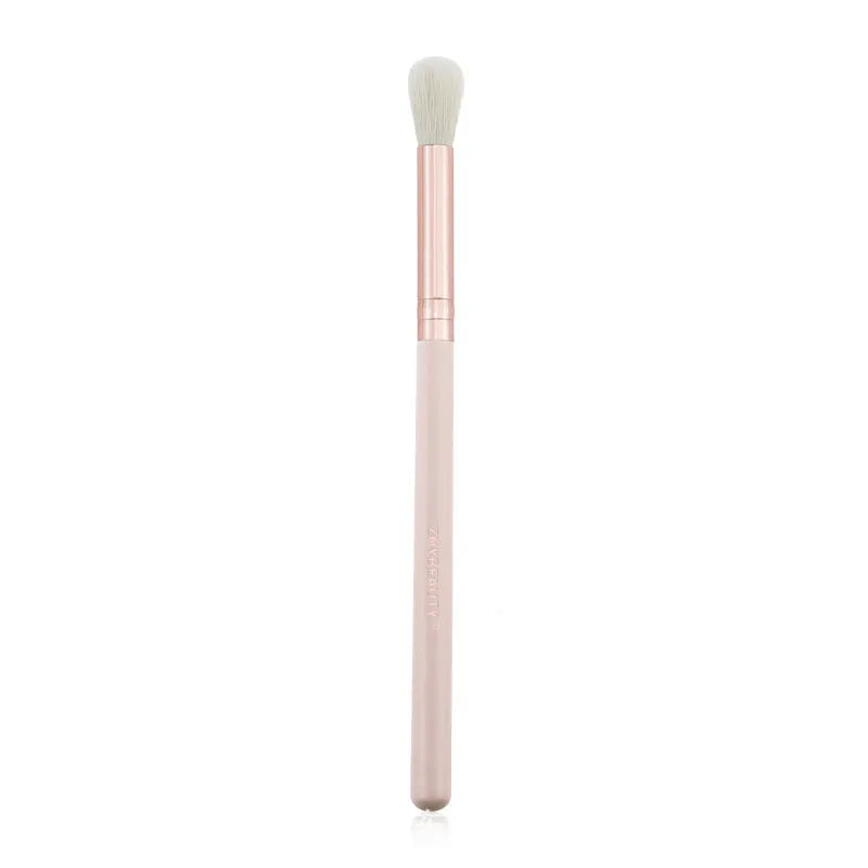 26 pink wooden handle makeup brushes arranged in a pink PU zip case.