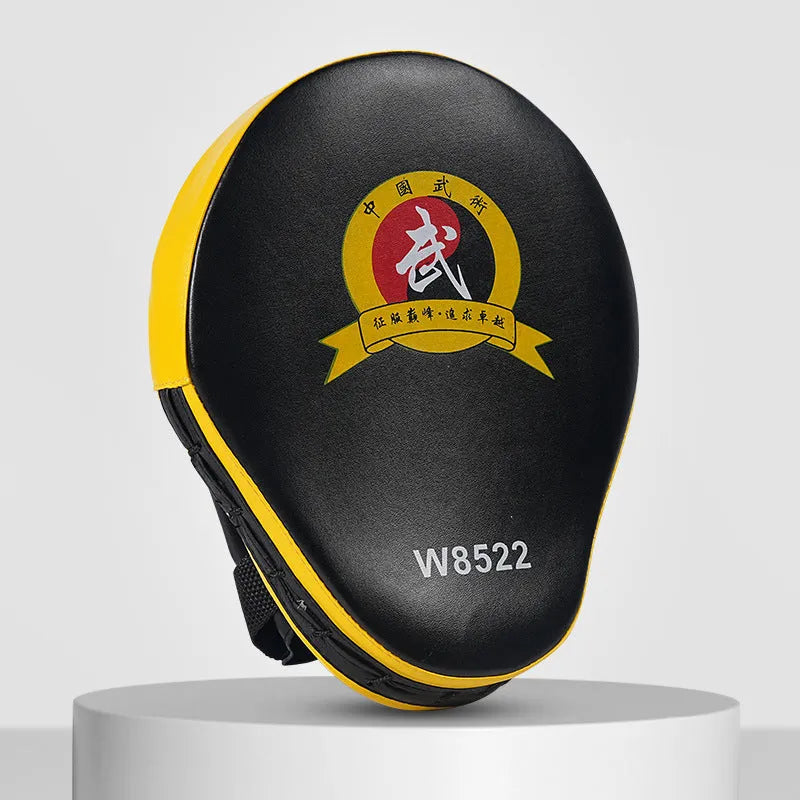 A pair of PU punch mitts for boxing and Muay Thai training, shown in a red edge and black surface colour variant.