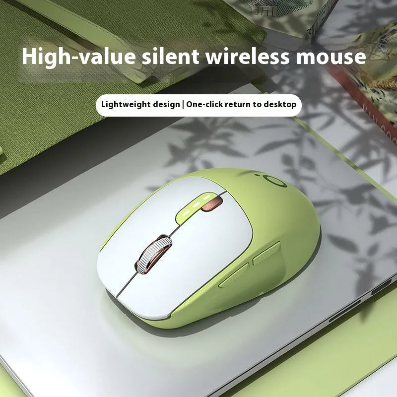 Mute dual-mode wireless Bluetooth computer mouse in Matcha Green colour on a desk.