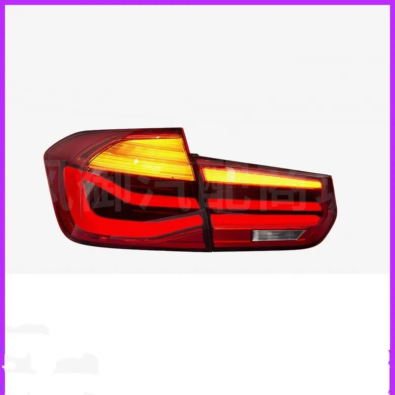 BMW 3 Series red and smoked black LED tail light assembly showing streamer design