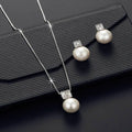 Versatile square pearl earring necklace jewellery set in rose gold with rhinestone cube details and box chain